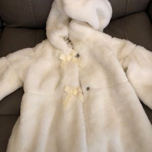 Baby girls cream colored fur coat